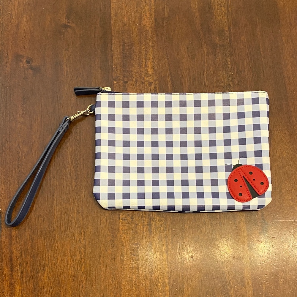 Stylish Checkered Wristlet with Dark Strap